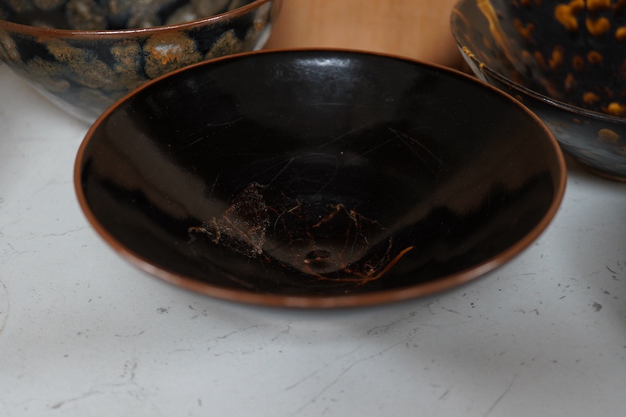 Four Chinese ‘hares fur’ pottery bowls, largest 16cm diameter. Condition - good